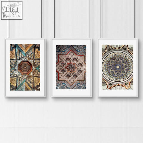 Three colorful geometric patterns art prints in white frames perfect as wall art prints for bedroom walls