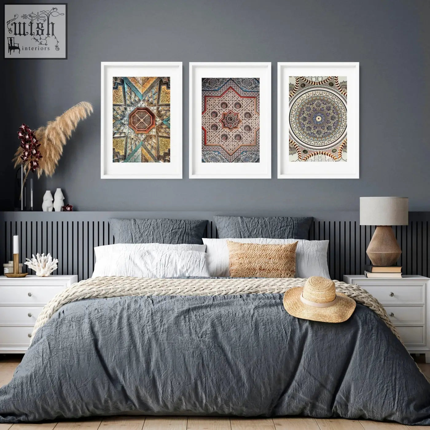 A woven straw hat with a beige band rests on the bed near geometric patterns art prints for bedroom wall art prints