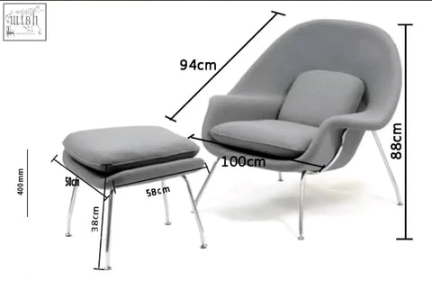 Gray upholstered george womb chair with chrome legs and matching ottoman for cozy seating and relaxation