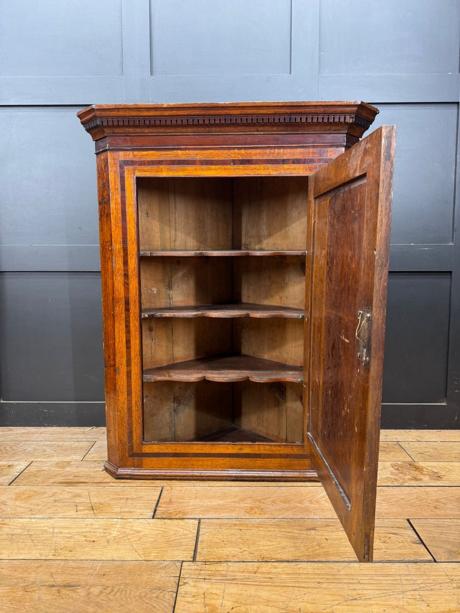 Antique genuine georgian oak corner cupboard with warm amber finish and intricate marquetry for hall storage