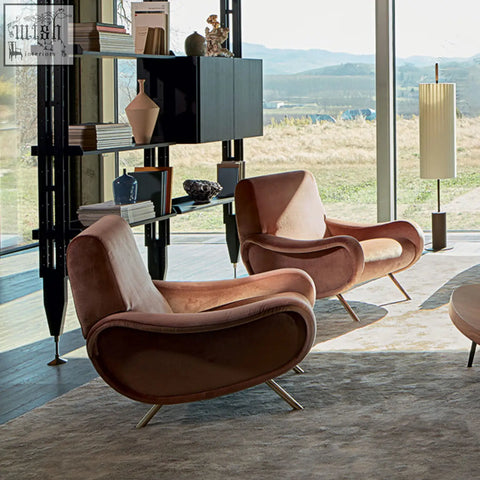 Pair of georgios lounge chairs in dusty rose velvet with sleek chrome legs perfect for stylish living spaces