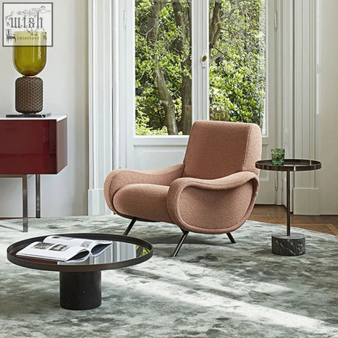 Georgios lounge chair in dusty rose linen with soft textured fabric and sleek black metal legs perfect for lounge chairs