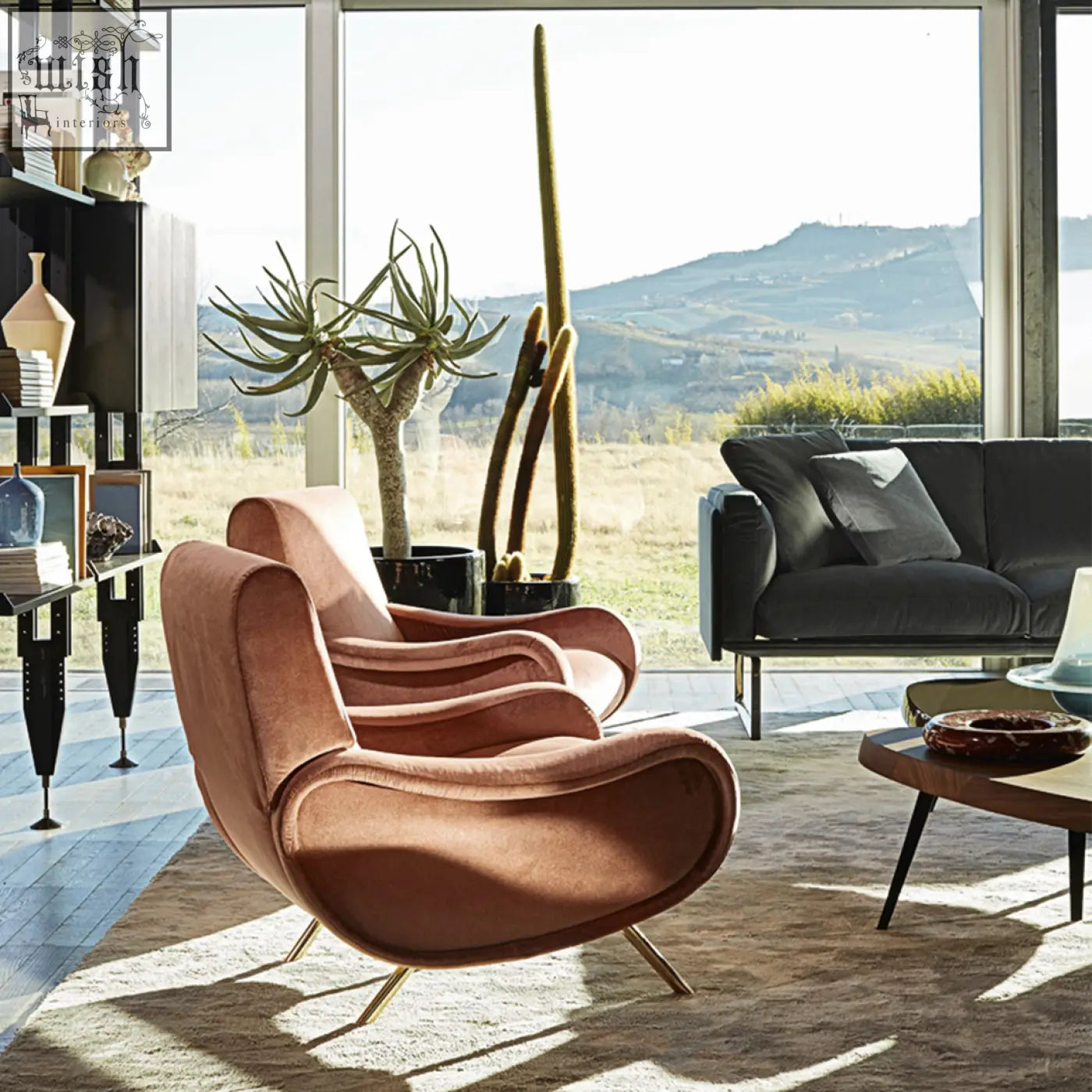 A plush rose gold velvet georgios lounge chair with sleek gold metal legs perfect for stylish lounge chairs setup