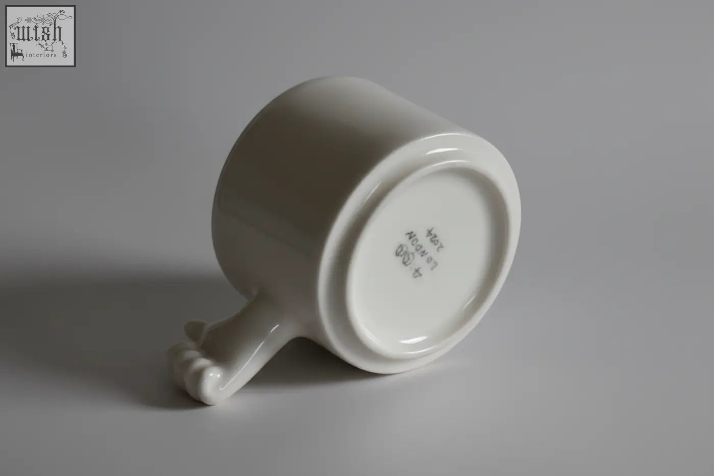 Gesture ceramic cup 4am product design handmade white porcelain coffee cup with smooth glossy finish and rounded handle