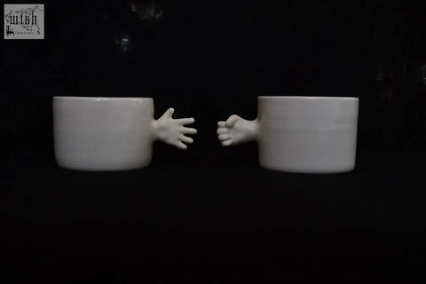 White ceramic gesture ceramic cups with sculpted hands open and fist design handmade porcelain coffee cup 4am product design
