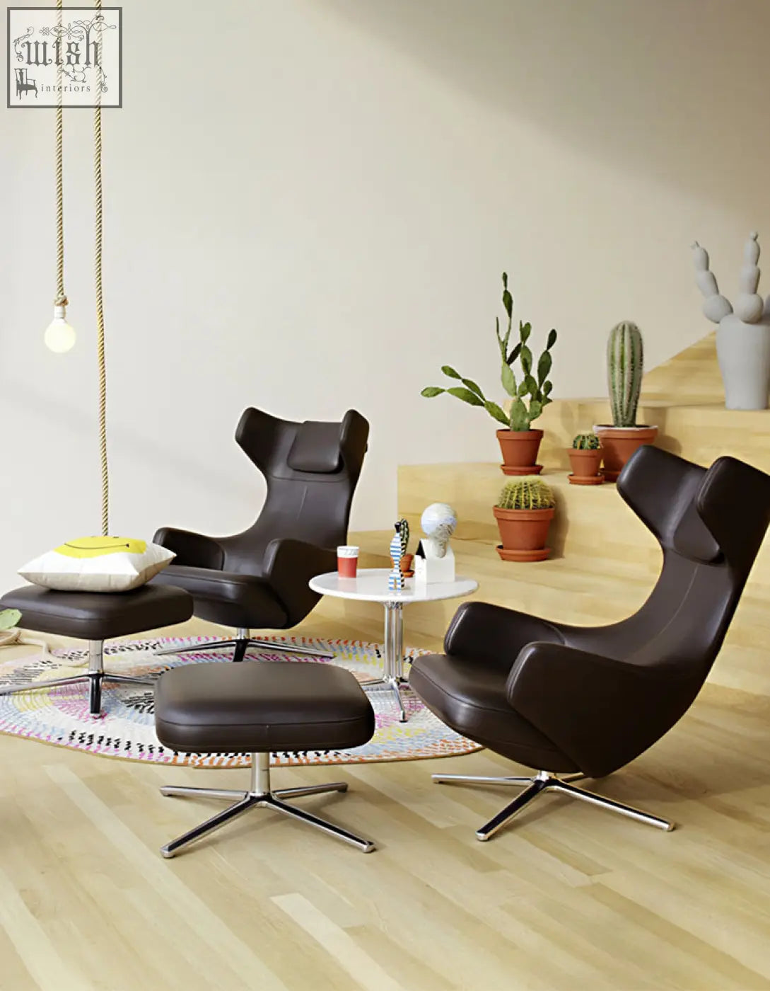 Dark brown leather ghoshal egg chair with chrome star base wingback lounge chair with recliner and footstool