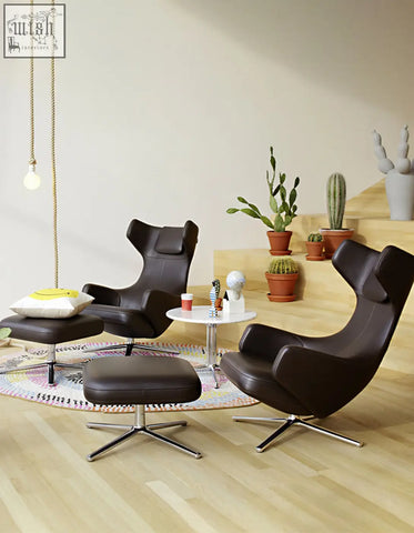 Dark brown leather ghoshal egg chair with chrome star base wingback lounge chair with recliner and footstool