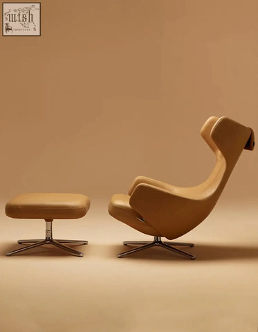 Tan leather ghoshal egg chair with chrome star base and matching ottoman wingback lounge chair with recliner