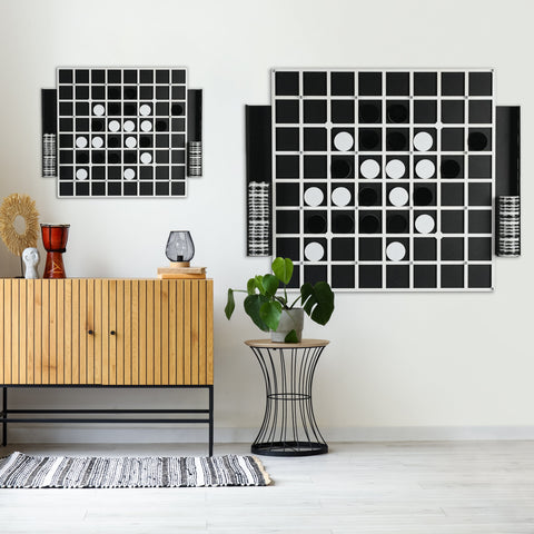 Black and white giant reversi game board wall art with circular cutouts and hanging instructions for all age ranges