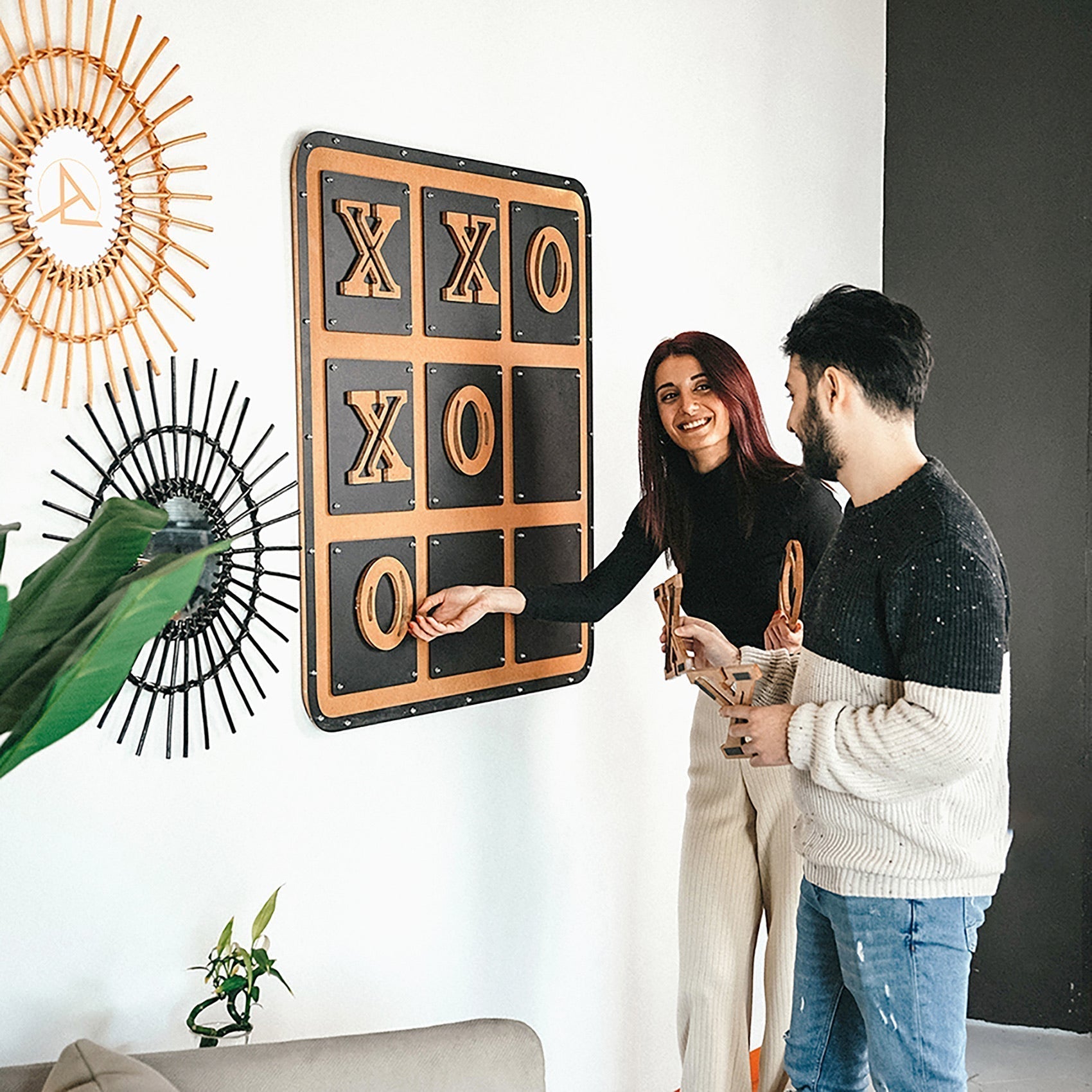 Giant xox board tic tac toe wall game with rustic wooden pieces and black metal frame for three in a row fun