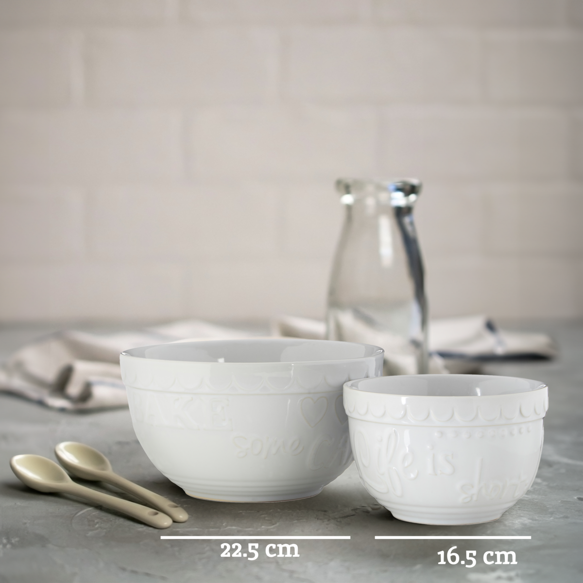 Gigi white set of two mixing bowls in ceramic with subtle embossed patterns and smooth rounded edges