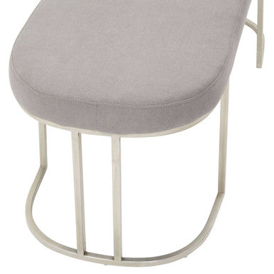 A sleek gilden grey bench with soft gray upholstered seat and slender metallic legs for modern seating