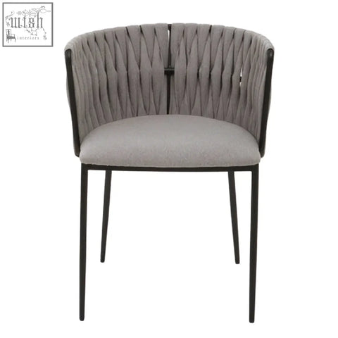 Gilden grey dining chair with woven textured back and sleek black metal legs for stylish grey dining seating