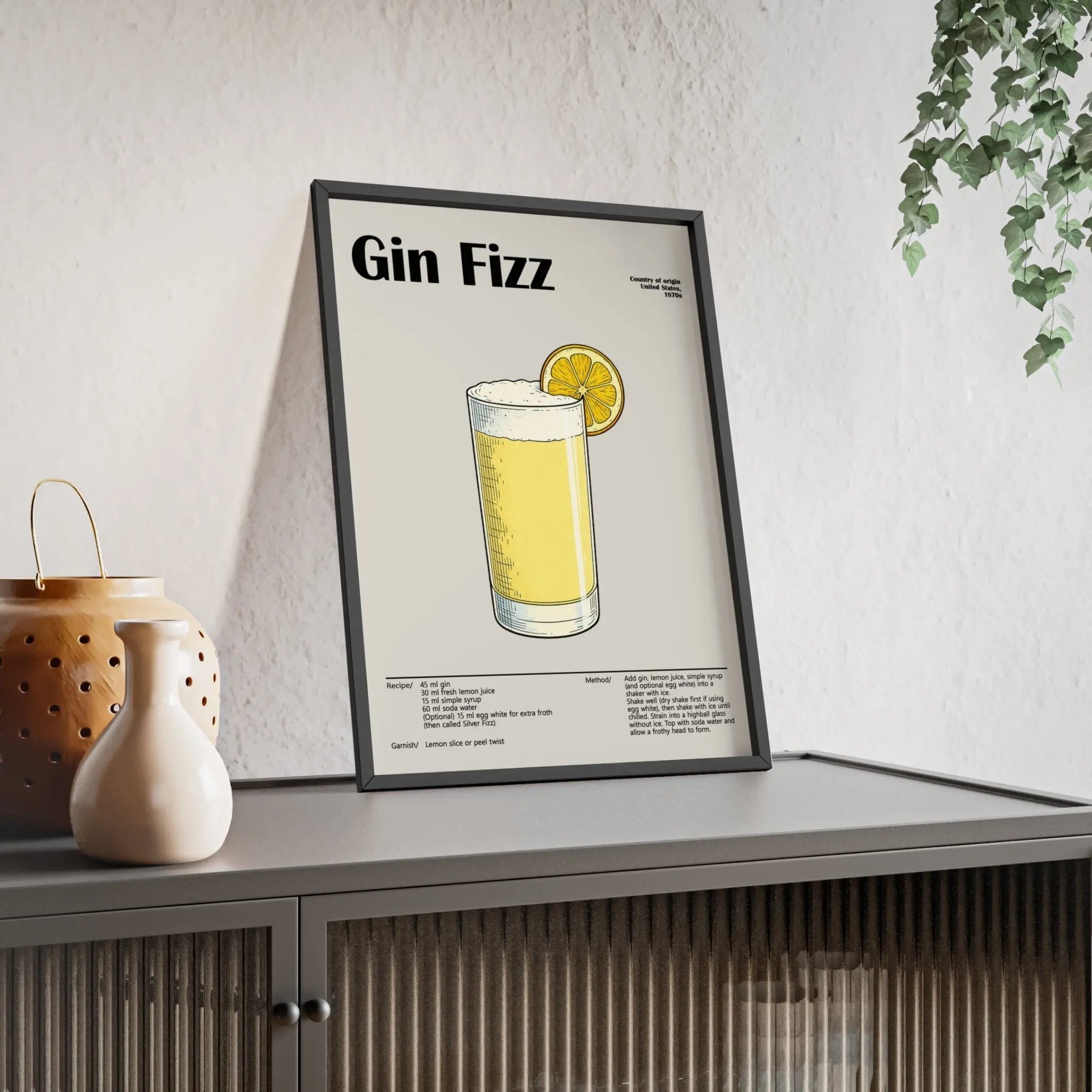 Black-framed gin fizz cocktail poster with minimalist illustration and lemon garnish on off-white background wall art