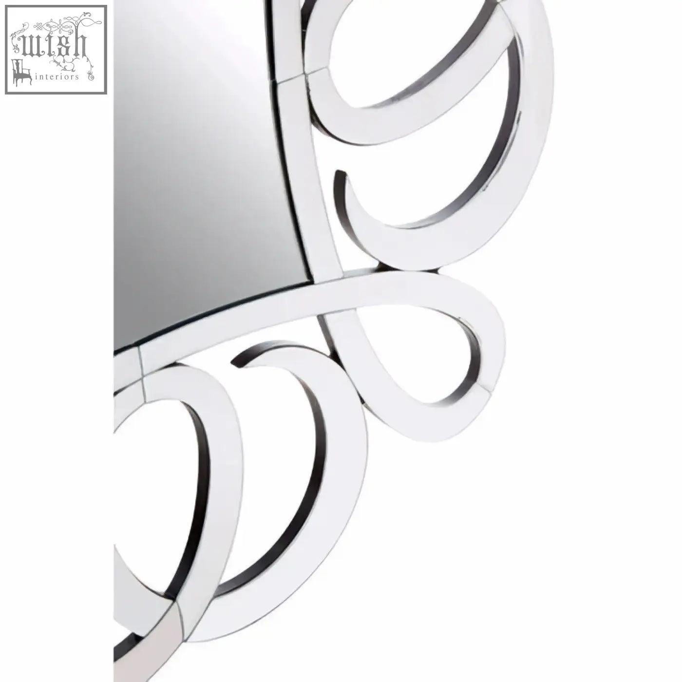 Silver-framed gladis wall mirror with ornate swirling design perfect for elegant wall mirror decor
