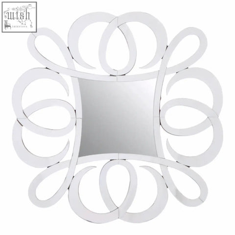 A sleek gladis wall mirror with a square reflective center and polished white metal circular frame design