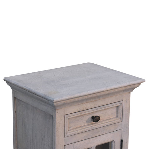 Rustic gray glazed stone bedside table with distressed finish featuring one drawer and cabinet door below