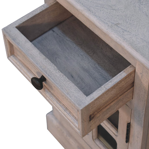 Rustic glazed stone bedside table with light gray distressed wood and black metal drawer knob for bedroom use