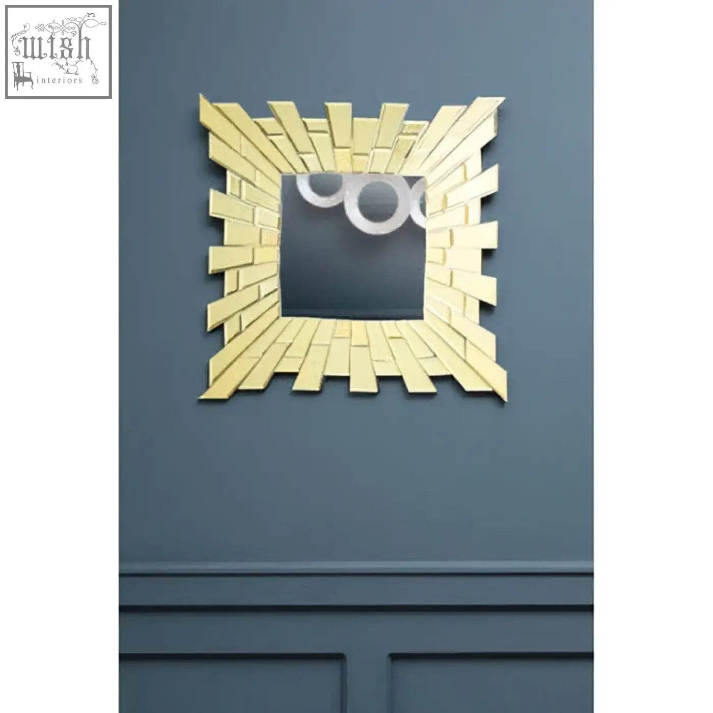 Glitzy small square wall mirror with gold-toned sunburst design and three circular cutouts at the top