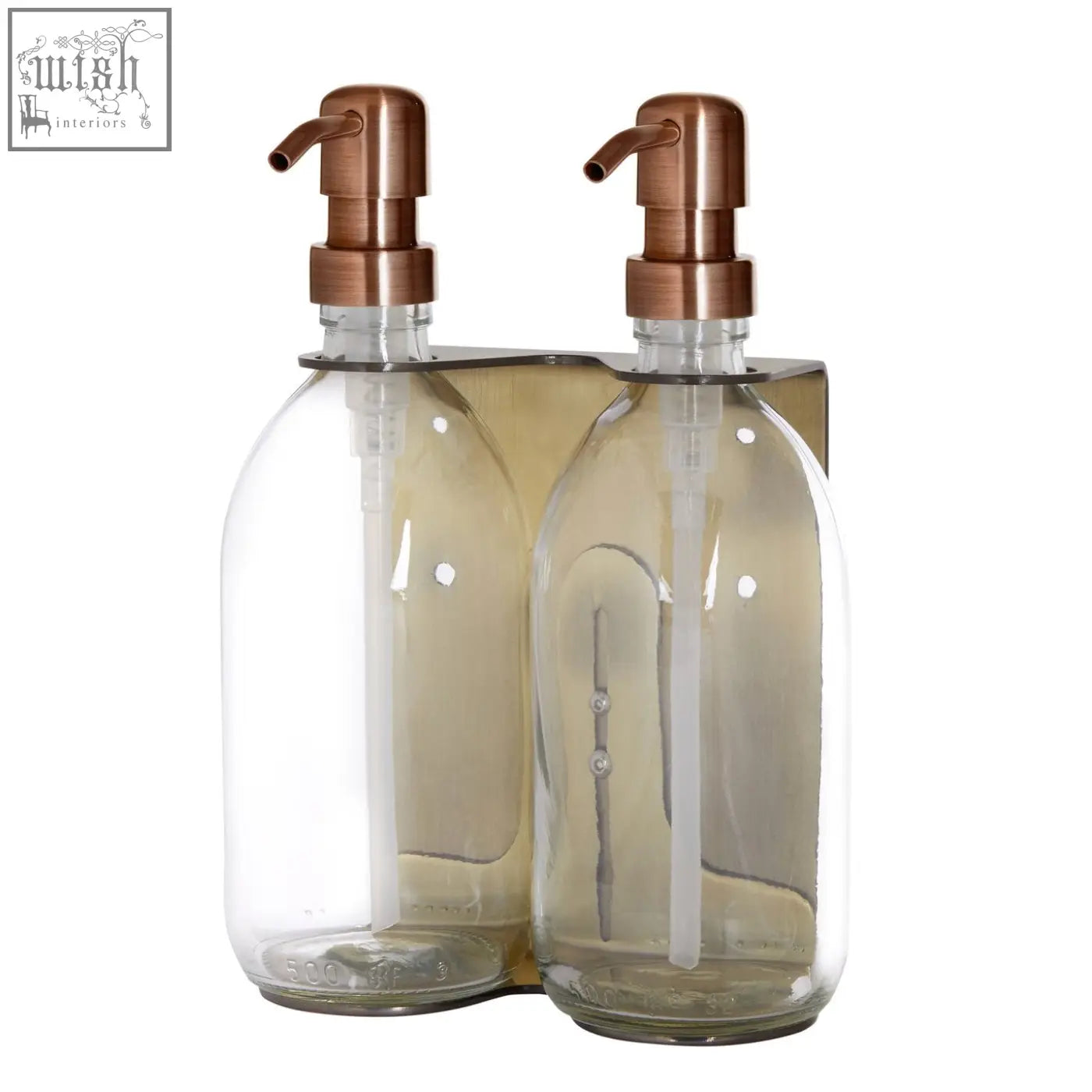 Gold double wall mounted soap dispenser with refillable glass bottles and copper pump heads on a stainless steel bracket