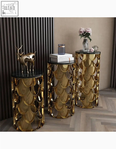 Gold nesting coffee table with gold metallic scalloped sides and black marble tops perfect as a gold coffee table