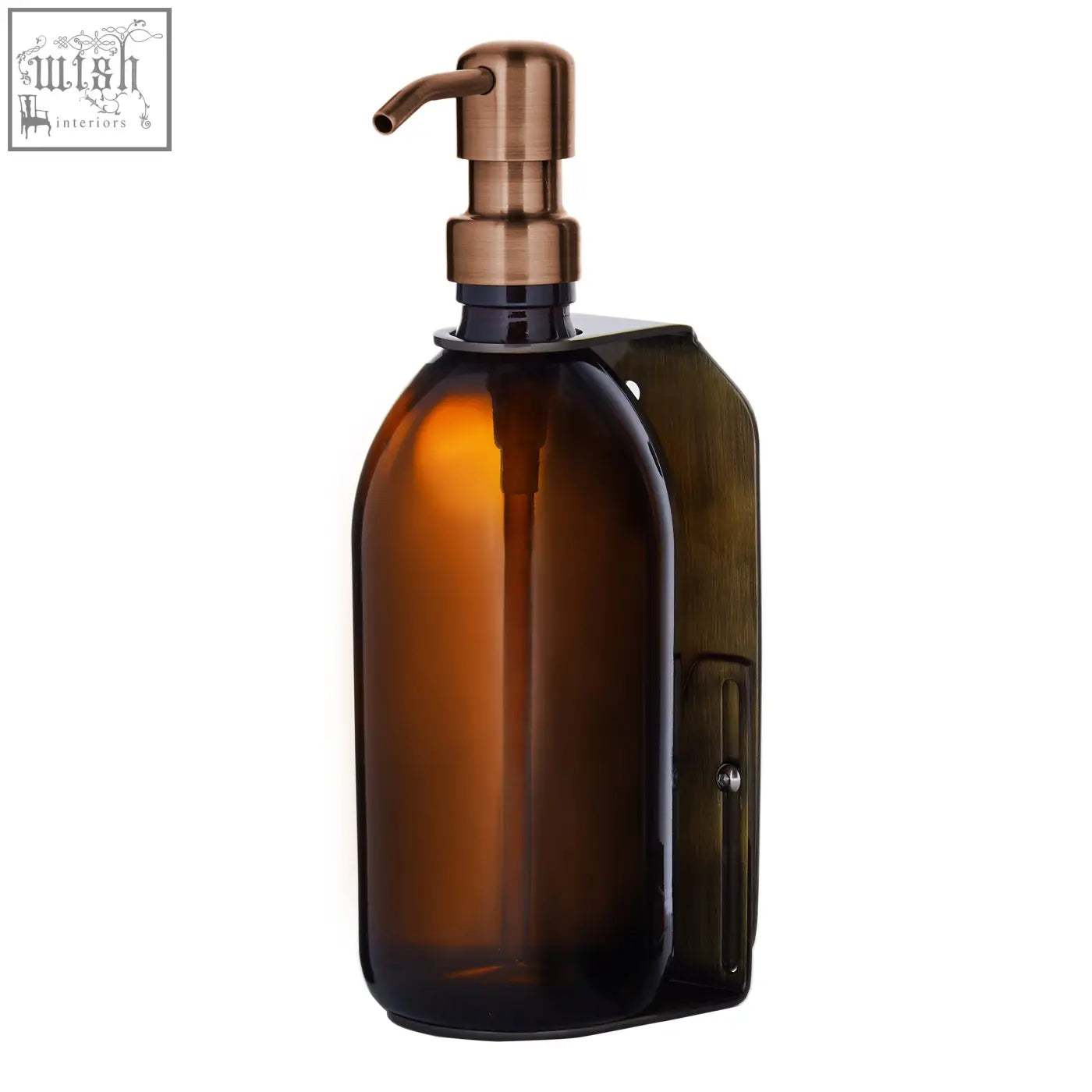 A sleek amber glass gold wall-mounted soap dispenser with brushed copper pump and matching wall mount
