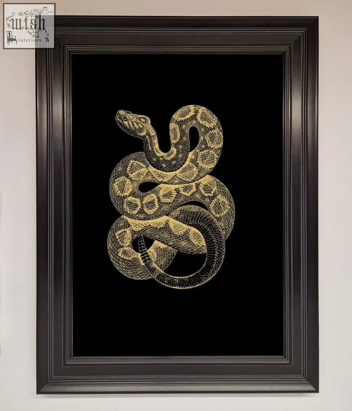 Elegant golden serpent framed wall art with gold embossed snake on black background in sleek dark wood frame