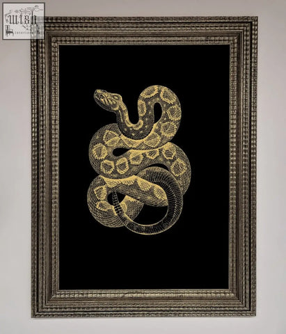 Elegant golden serpent framed wall art featuring a gold-leafed snake in a silver-toned ornate frame on black background