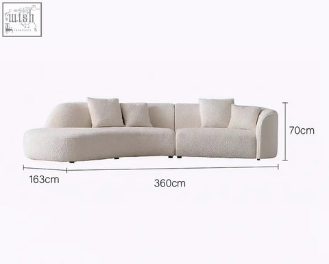 Cream-colored plush shaggy fabric goldie gubi three seater sofa with four matching throw pillows in boucle white