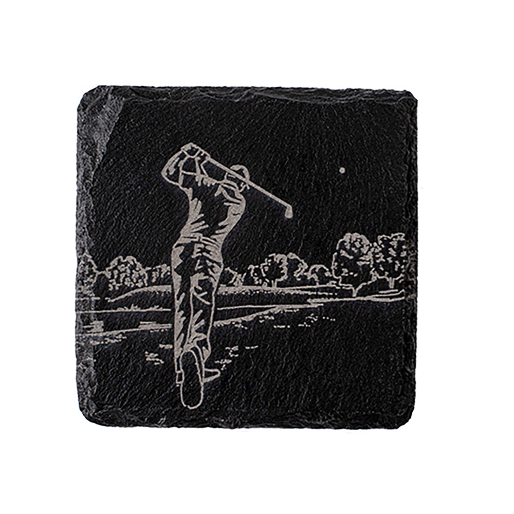 Black slate single slate coaster engraved with golf player mid swing against scenic course backdrop