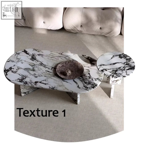 Elegant goliah coffee table set with black and white marble top and sleek metallic legs perfect for any living room