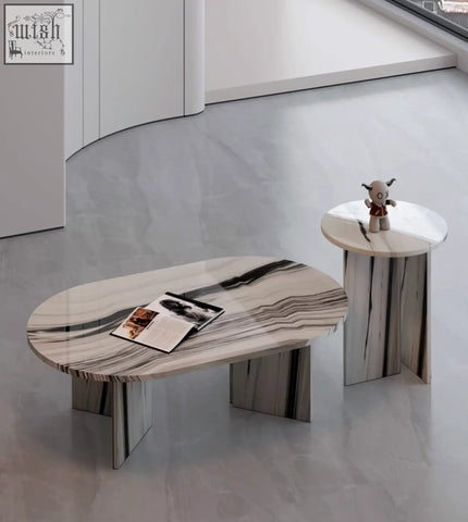 Modern goliah coffee table set with polished white and black veined marble top and sleek angular stone legs