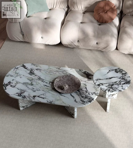 Modern white and black marble goliah coffee table set with sleek asymmetrical design for stylish living rooms