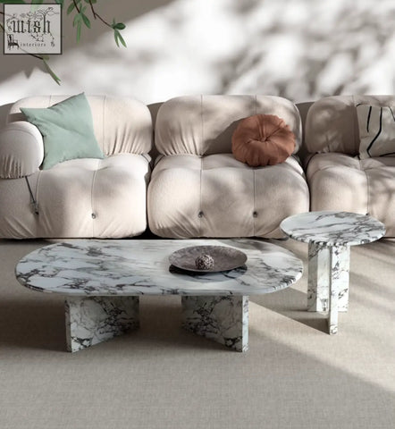 White marble goliah coffee table set with black veining featuring a coffee table and matching side table