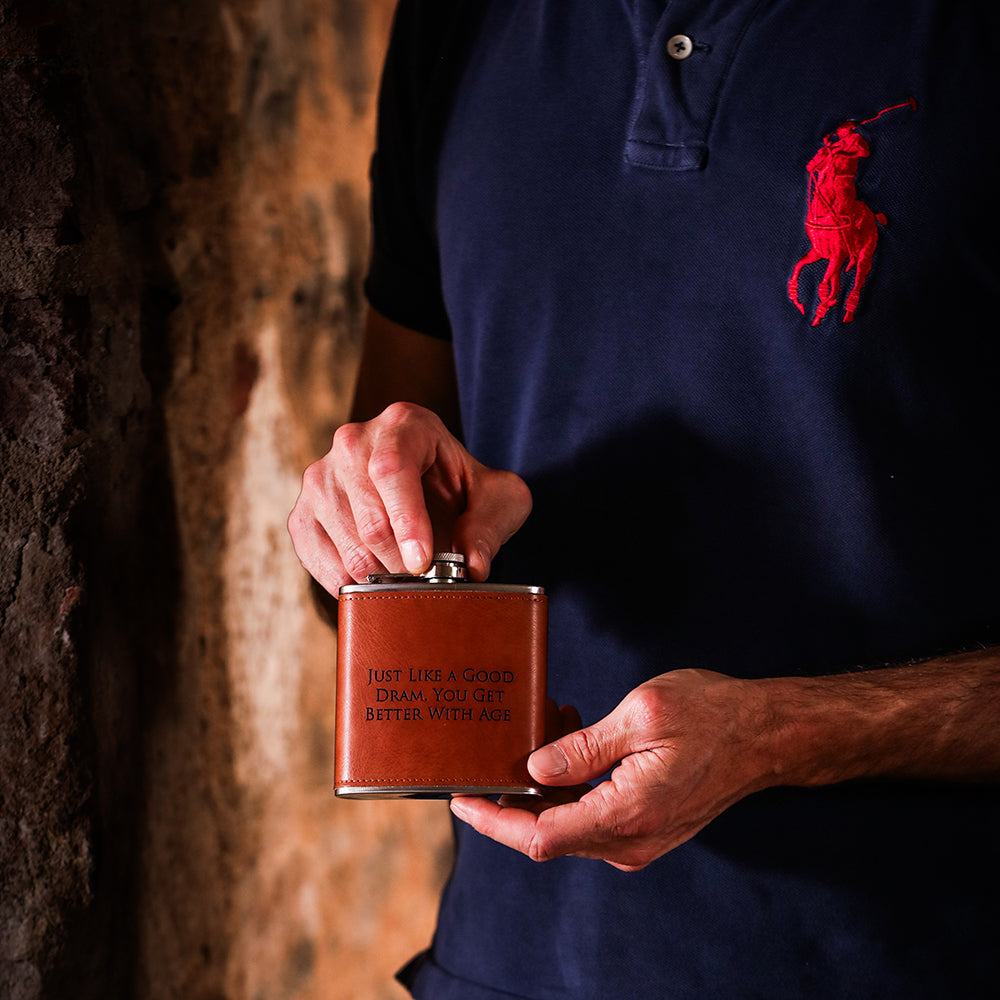 Brown leather hip flask engraved with just like a good dram you get better with age perfect leather hip flask gift