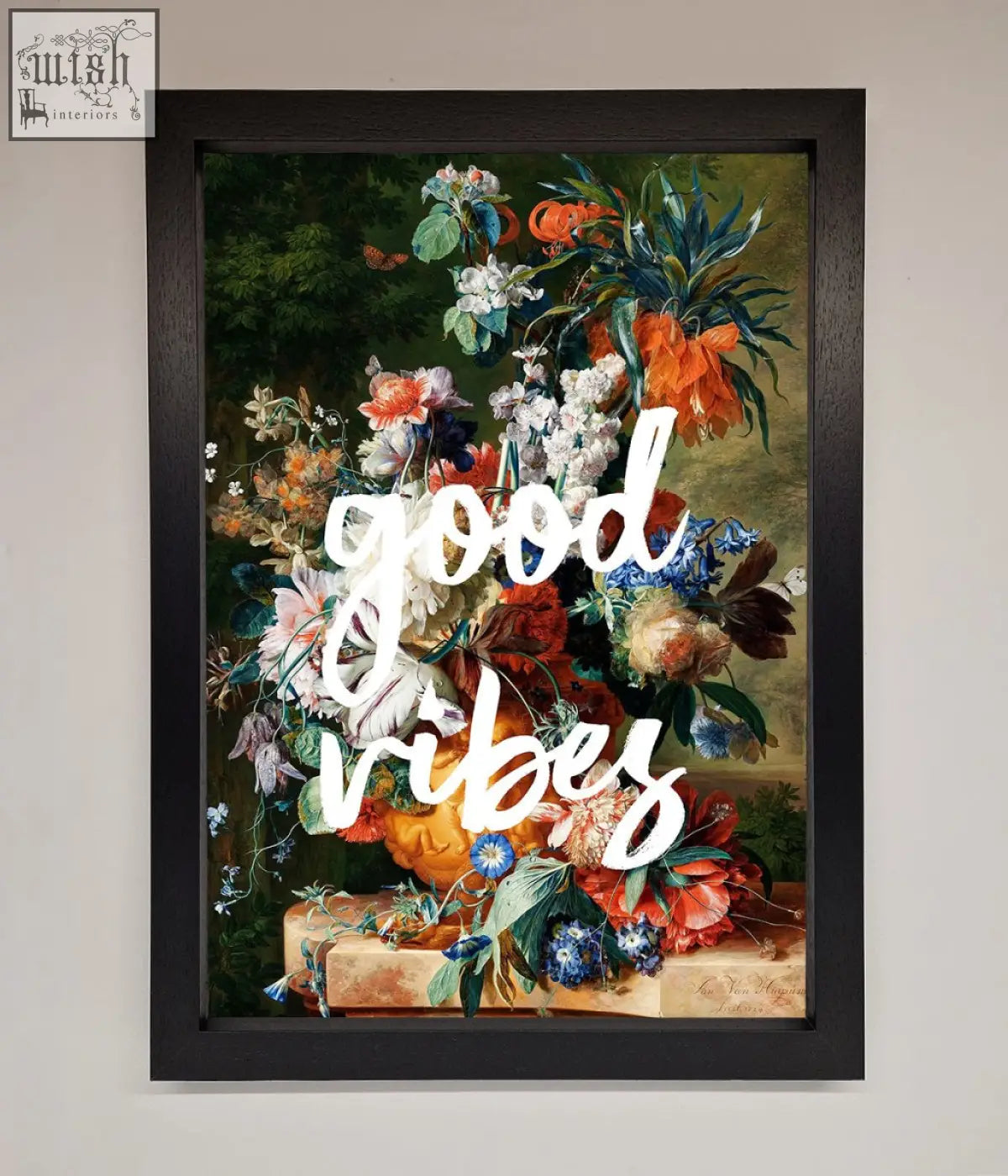 A good vibes framed wall art featuring vibrant orange white and blue floral blossoms over flowing script text