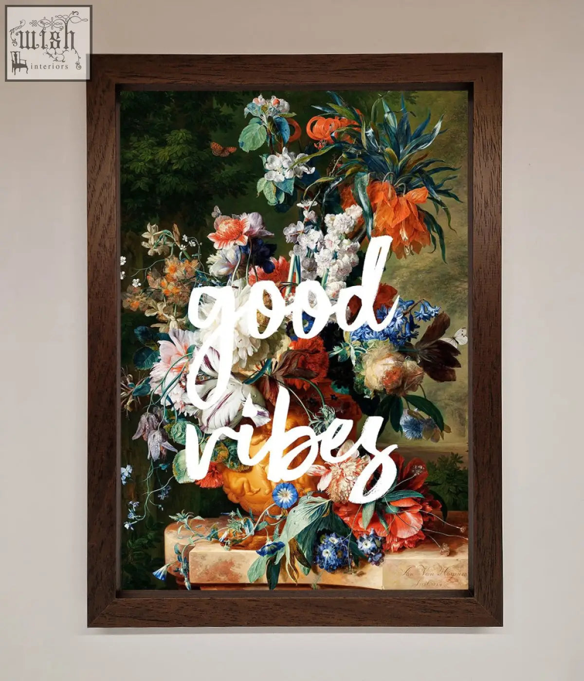 A good vibes framed wall art featuring vibrant orange white and blue floral still life in a dark wooden frame