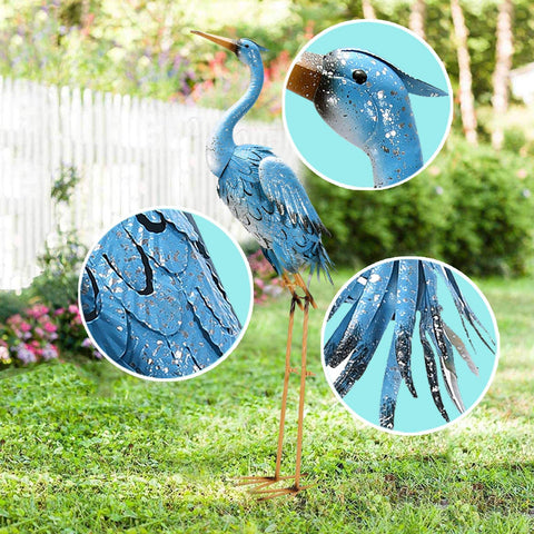 Blue painted metal heron crane statue with detailed feathers and speckled finish goodeco 96cm standing blue design
