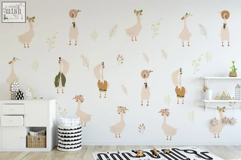 Goose nursery wall decals feature beige and brown cartoon geese with hats and greenery for a cute nursery wall design
