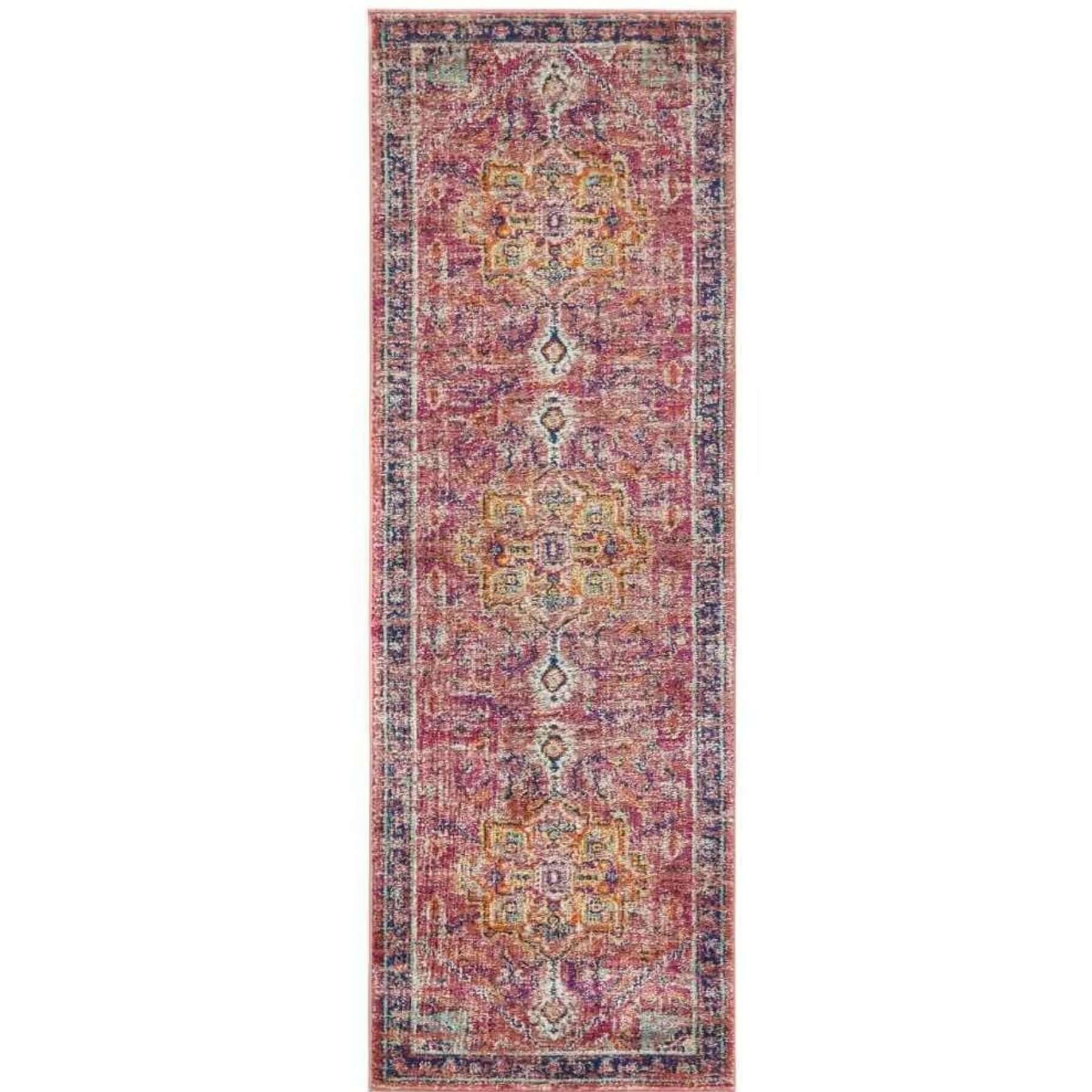 A granada multicolour vintage runner rug with faded pink and purple base and intricate gold green and blue geometric patterns