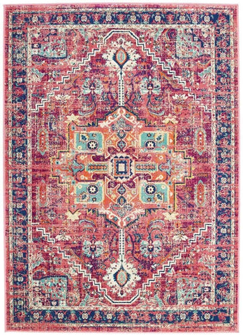 Granada multicolour vintage rug with faded red and teal medallion pattern on textured wool-like surface