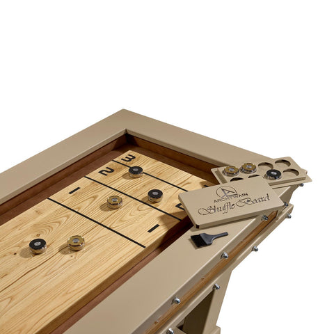 Beige wooden grand shuffleboard nature table with light wood surface black scoring lines and metallic puck holders
