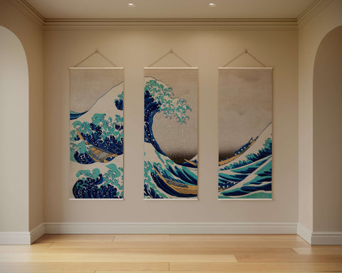 Three vertical canvas prints of great wave off kanagawa tapestry in deep blues teal and gold on beige background