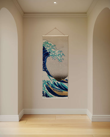 A hanging kanagawa tapestry featuring the great wave with dynamic blue and white waves and a small boat below