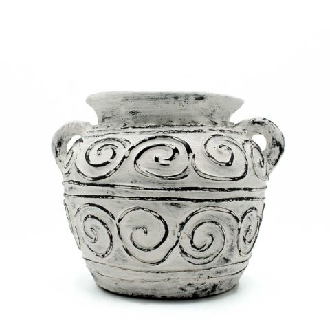 A rustic cream greek clay plant pot with two handles and decorative spiral patterns perfect for plants