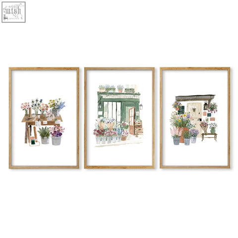 Set of 3 green art flower shop art prints with pastel blooms in rustic wooden frames perfect for dining room decor
