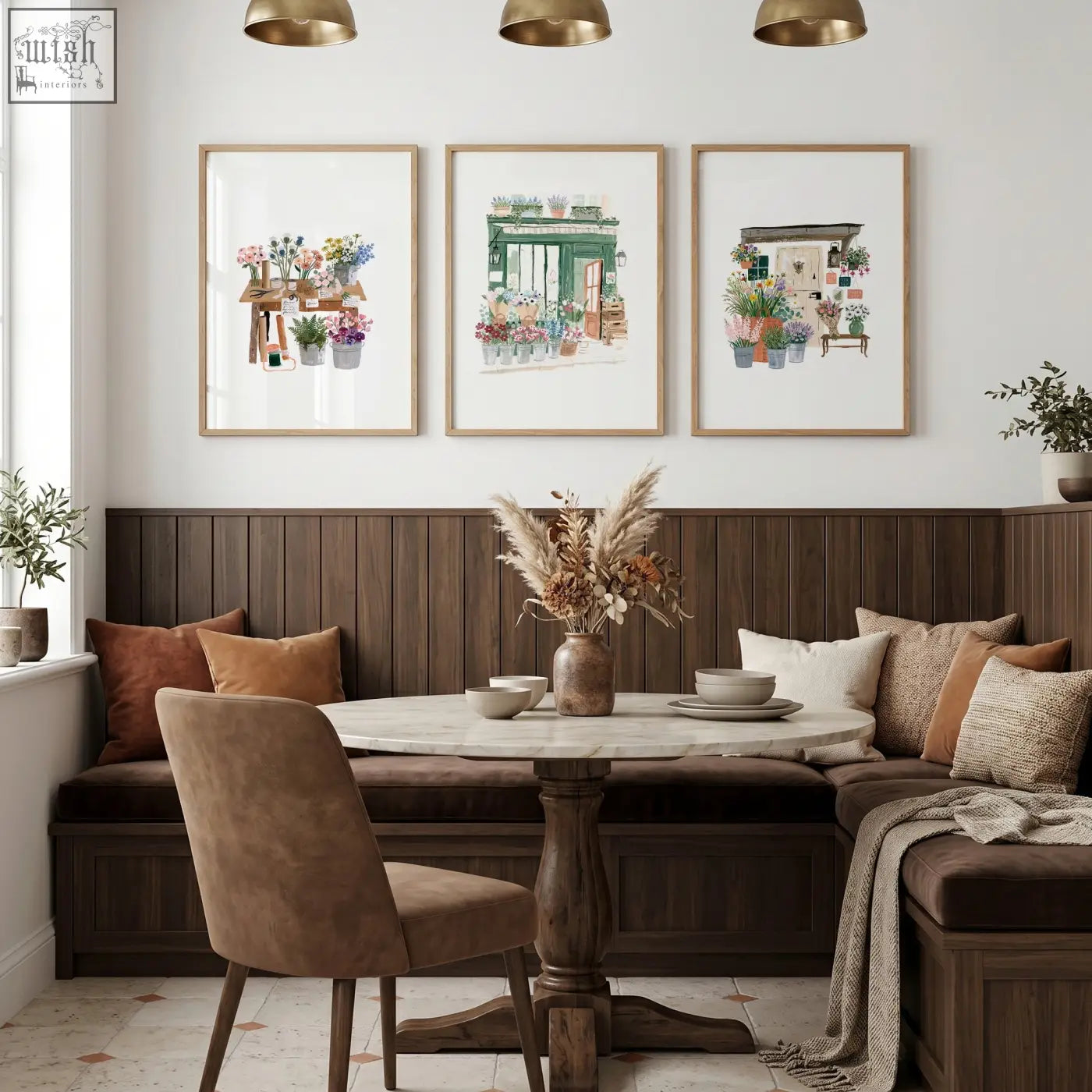 Round marble-top dining room table with dark wood pedestal base paired with green art flower shop prints set of 3