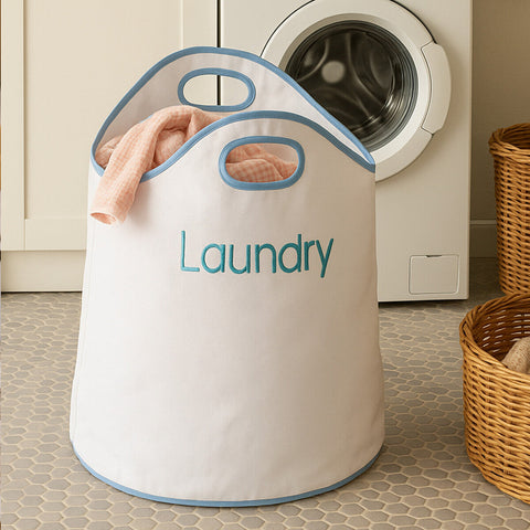 Green loop white laundry hamper with light blue trim and embroidered laundry text for easy clothes storage