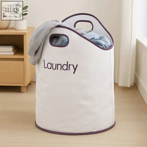 Green loop white and purple laundry bag with large opening, purple handles, and laundry printed in black
