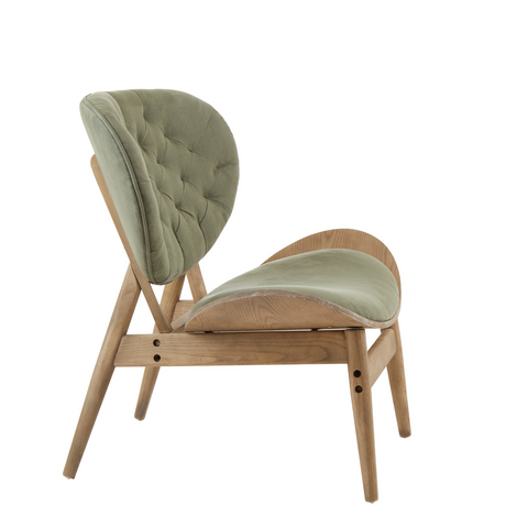 A green velvet chair with a curved grey elm wood frame and tufted velvet upholstery by vinsi